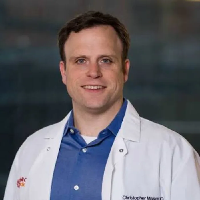 Dr. Christopher Mason